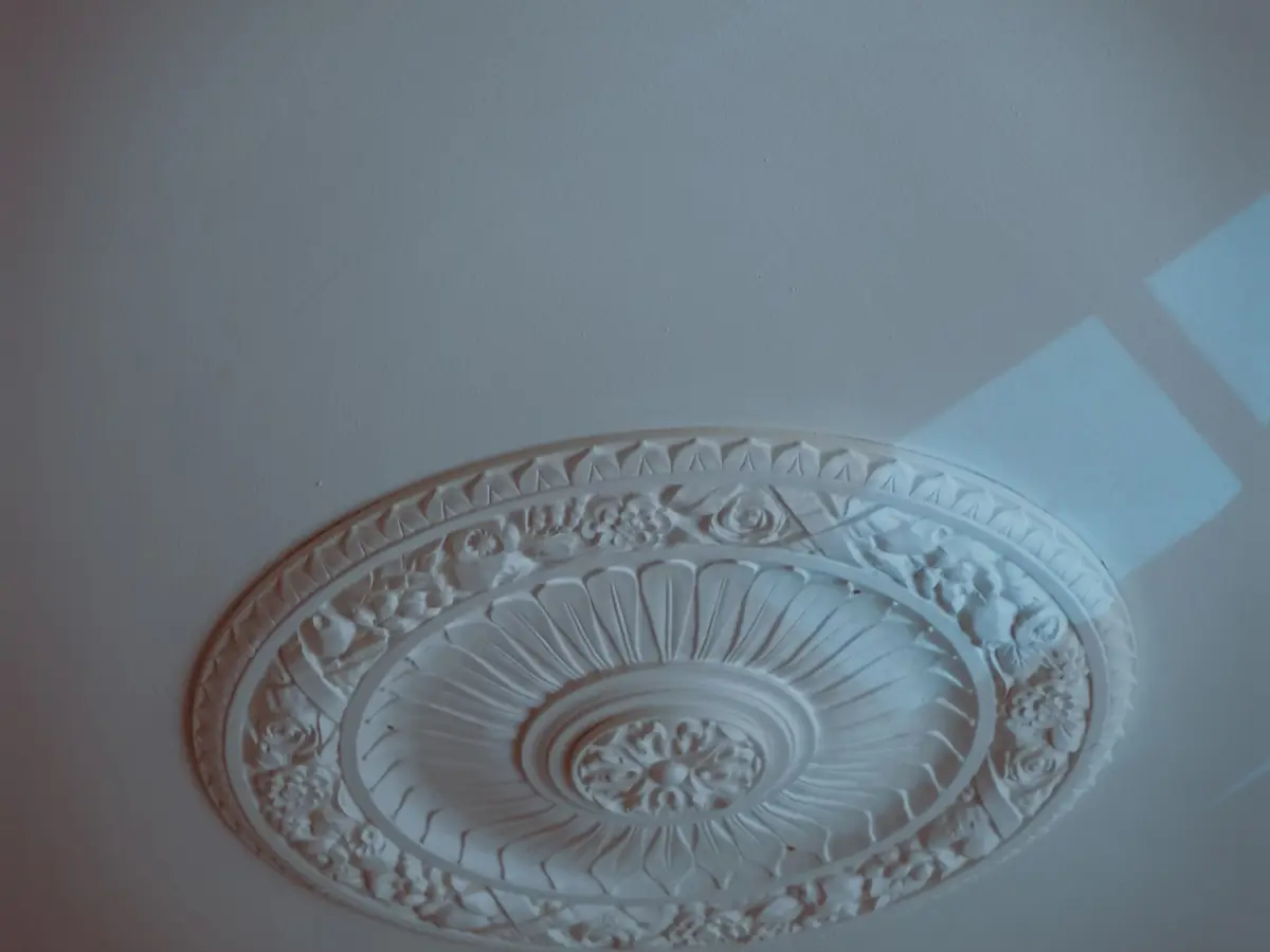 Cast plaster ceiling medallion